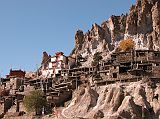 Annapurna 12 10 Braga Braga (3500m) is a Tibetan-style village of about 200 houses hiding behind a photogenic steep, eroded rock outcrop. The houses are stacked one atop the other, each with an open veranda formed by a neighbours rooftop. The gompa is perched on a high crag overlooking the village, and is estimated to be 400 to 500 years old. The gompa comprises three main buildings and belongs to the Kagyu sect of Tibetan Buddhism.
